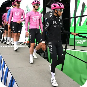 Cyclists walking off the bike, demonstrating the stability of the rubberized walkable cleat